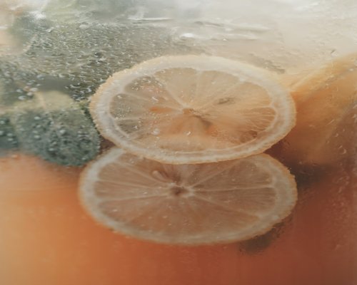 Glass of water with lemon and mint